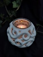 Serenity Glow: The Elegant Round Candle Holder - White color